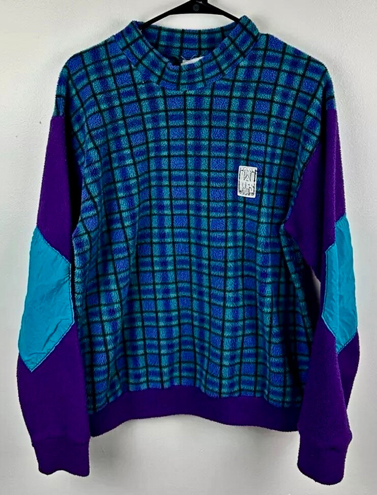 Vintage Rad Rags plaid fleece pullover from around the 1980s, with purple and teal sleeves